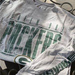 Mens long sleeved Green Bay Packer shirt sized medium